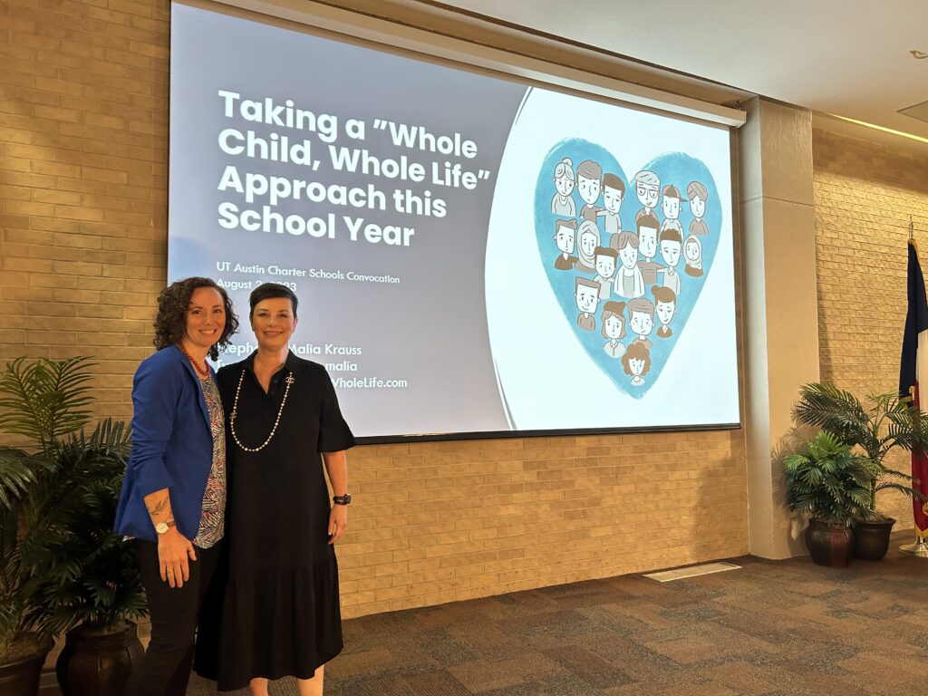 Author Stephanie Malia Krauss on stage with Dr. Melissa Chavez