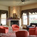 Group therapy room, showing five chairs in a room with a fireplace