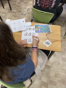 Over the shoulder photo of a student working 