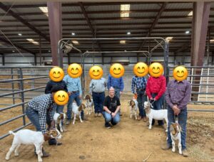 Pathfinders team at the show, all faces are blocked except Ms. Grona