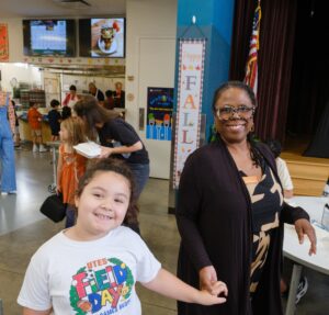 Superintendent Whetstone with a UT Elementary Student